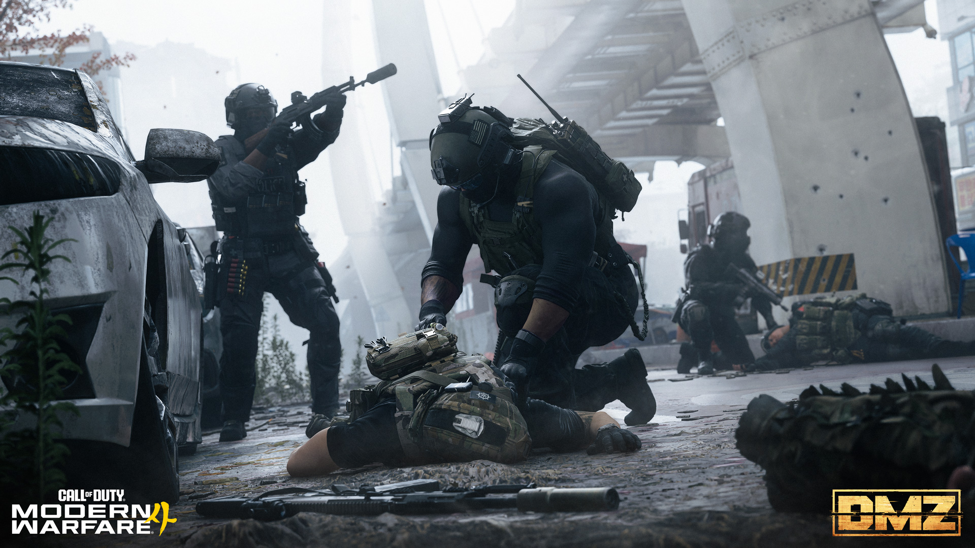 DMZ squad members beside a downed Operator.